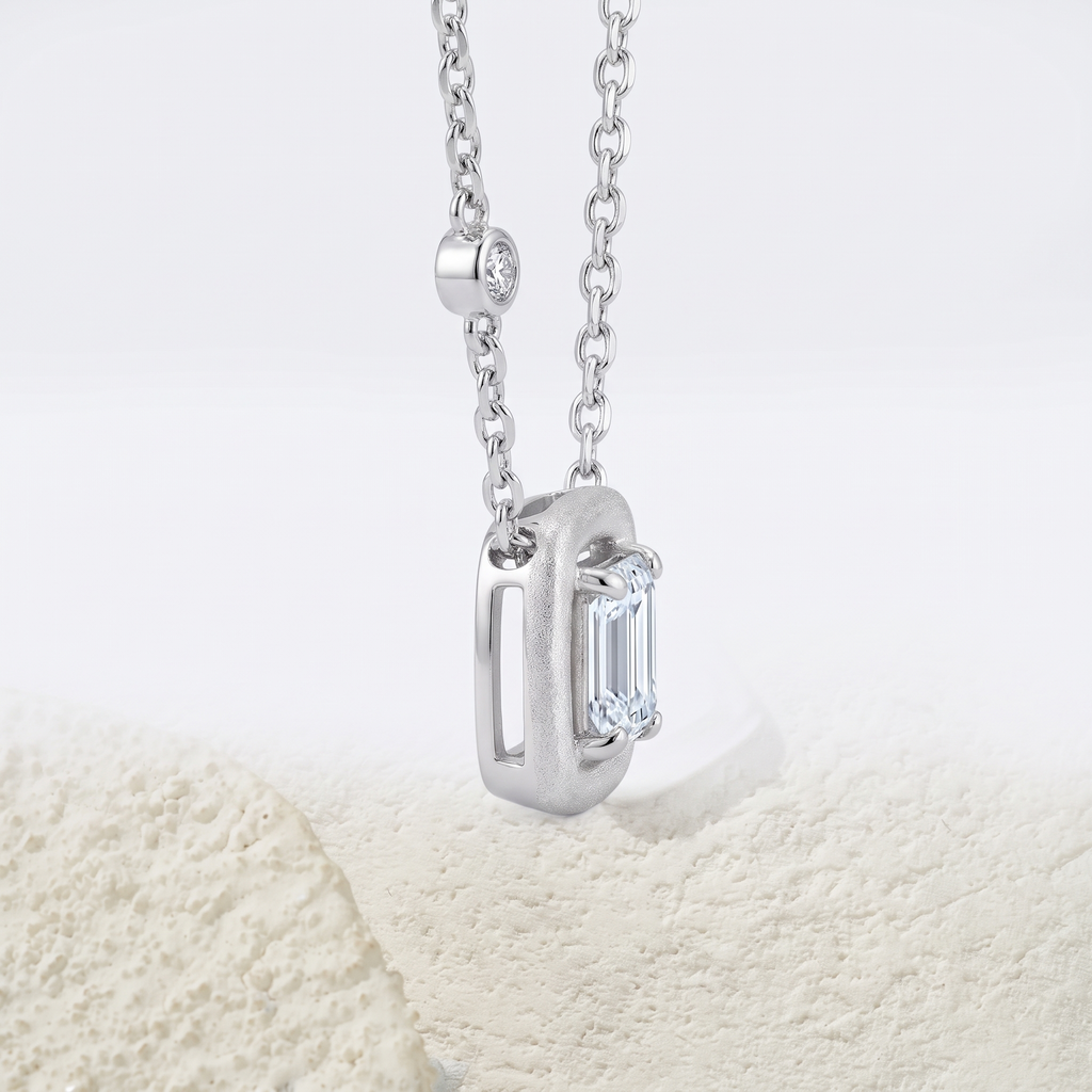 Side profile of Marhabu S925 emerald-cut moissanite square pendant necklace